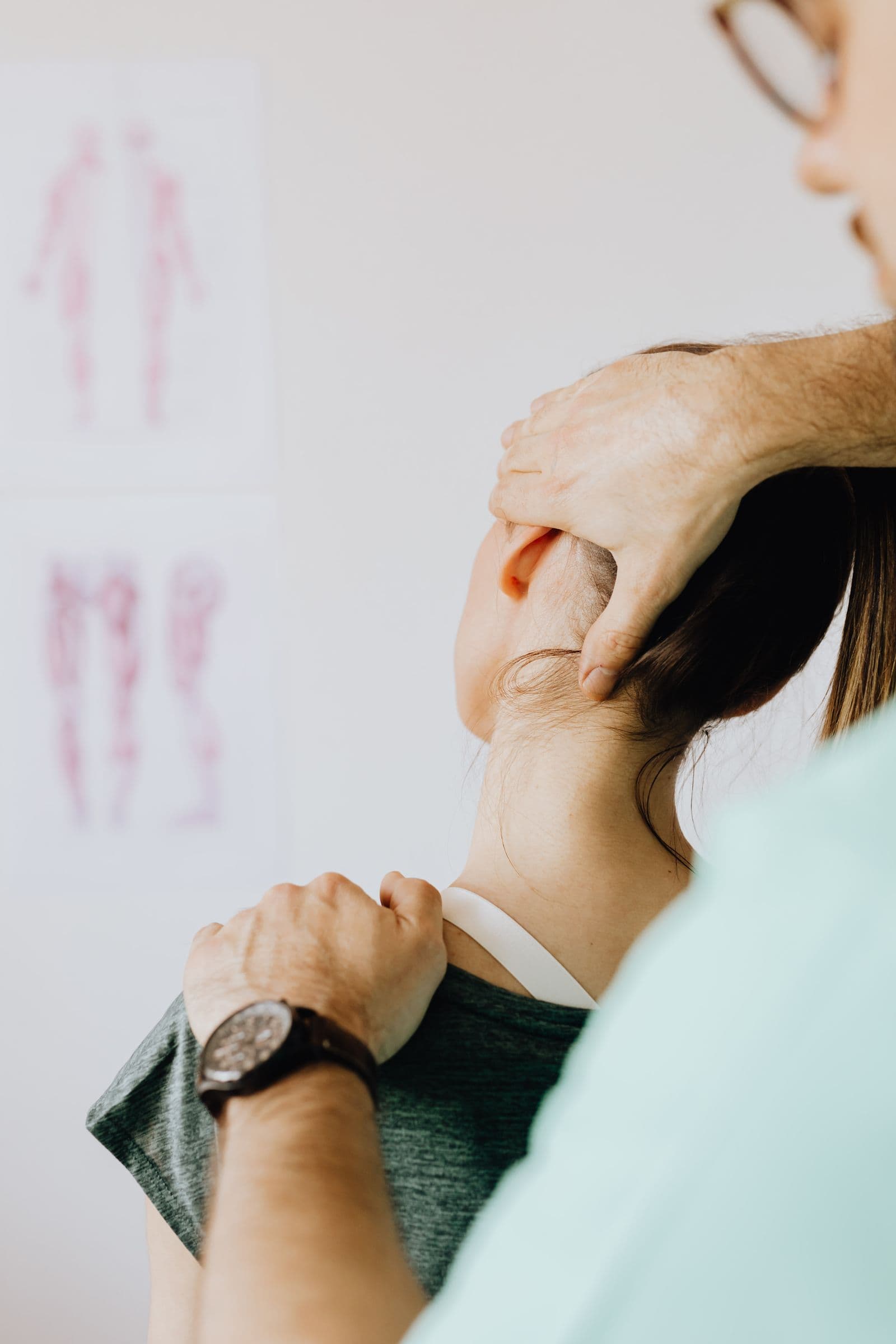 Remedial therapist treating a client at the clinic